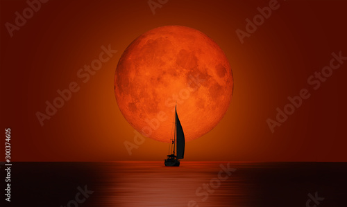 Lone yacht with full moon "Elements of this image furnished by NASA "