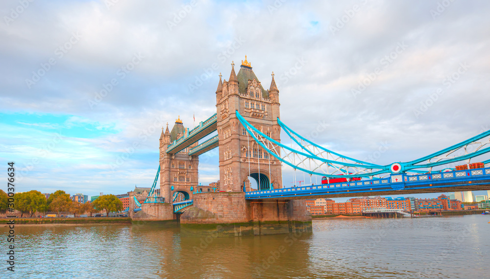 Tower Bridge and Tower of London on Thames river - London England