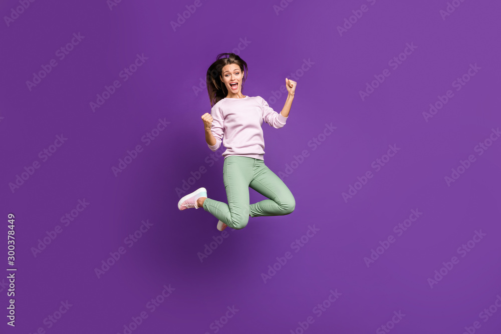 Full length body size view of her she nice slim fit cheerful cheery girl jumping celebrating perfect attainment having fun isolated on bright vivid shine vibrant purple violet lilac color background