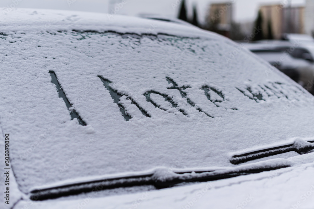 I hate winter phrase on the car window. Winter negative, concept