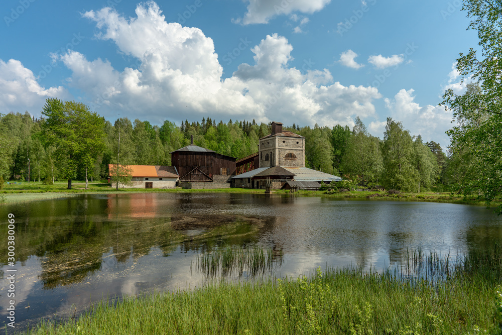 Old ironworks on the Swedish countryside in summer sunshine Old ironworks on the Swedish countryside in summer sunshine