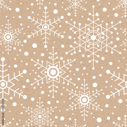 Snowflakes and snow on the kraft paper. Seamless vector pattern.