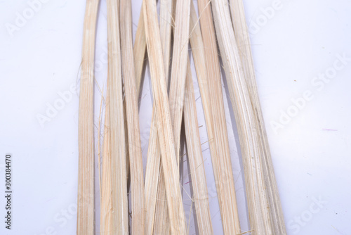 raw weave rattan on white acrylic sheet stock photo