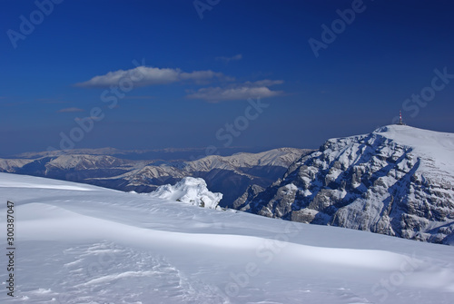 Mountain rock summit in winter