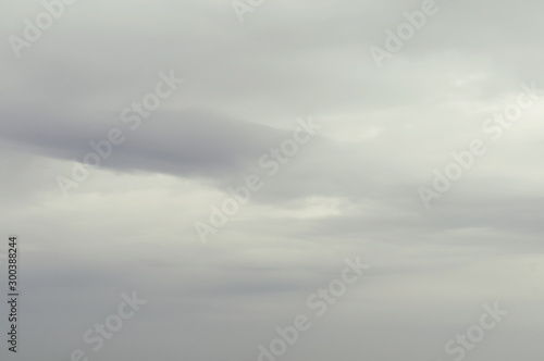 Soft background with stratus clouds. Dramatic cloudscape under cinematic color filter. photo
