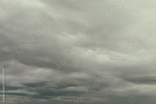 Soft background with stratus clouds. Dramatic cloudscape under cinematic color filter. photo