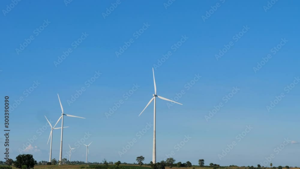 Scenic landscape of the wind turbine for electric power make against nature agriculture farm for renewable clean power from wind Scenic landscape of the wind turbine for electric power make against nature agriculture farm for renewable clean power from wind