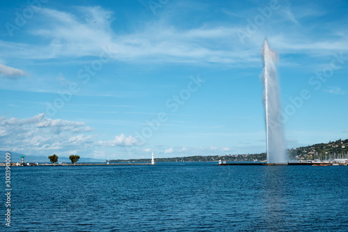 View from the shore to the fountain and lake in Geneva in autumn.