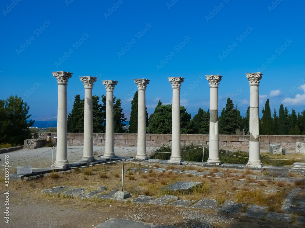 Side view of the columns of the healing temple Asclepeion with sea view