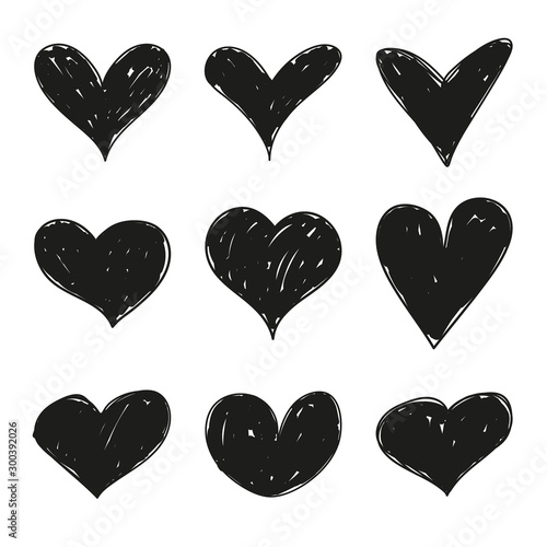 Set of black grunge hand drawn hearts. Vector collection of unevenly colored hearts for Valentines Day sweethearts.