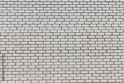 Texture of a white brick wall for background