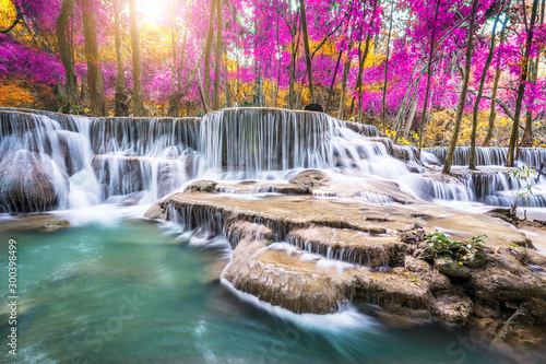 Amazing in nature, beautiful waterfall at colorful autumn forest in fall season