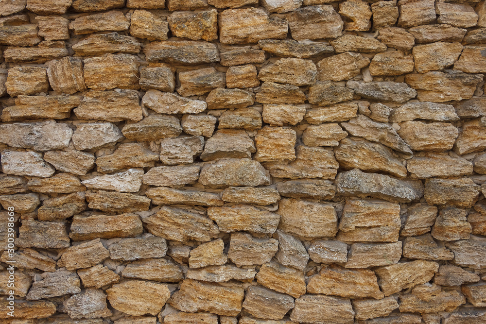 Wall of natural stone. Background for 3d