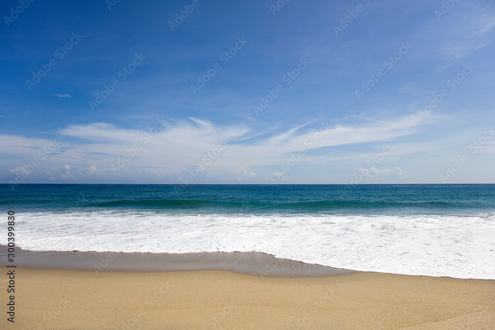 Soft beautiful Caribbean sea wave on sandy beach