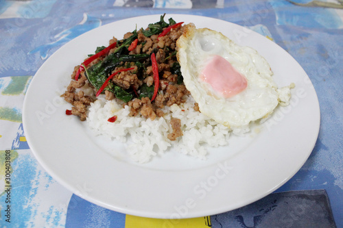 Rice with stir-fried basil leaves with minced pork and sunny up on top