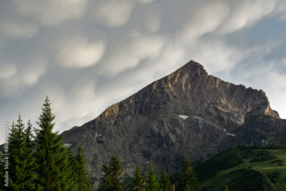 Mountaintop with mammatus clouds after storm