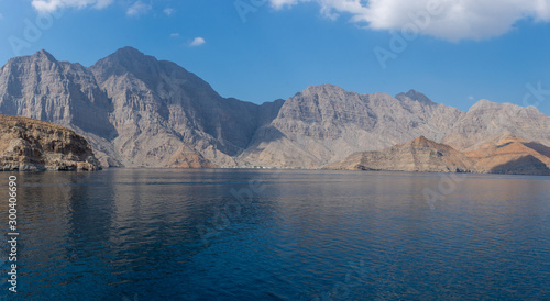 Spectacular panorama of the fjords and rocky mountains and blue waters of Khasab  Musandam  Oman in the Middle East near the Strait of Hormuz.