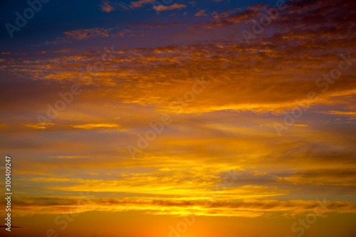 Fiery orange sunset sky. Beautiful sky. © Alik Mulikov