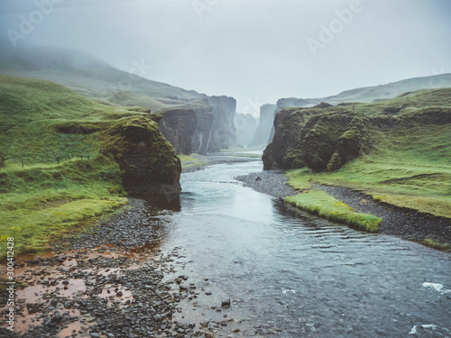 Famous fjadrargljufur canyon in Iceland with moody weather 