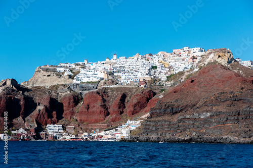 The villages of Amoudi Bay and Oia on the island of Santorini in Greece.