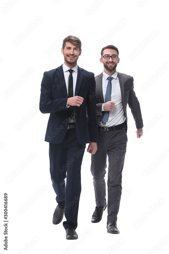 in full growth. two businessmen stepping forward. in full growth. two businessmen stepping forward.