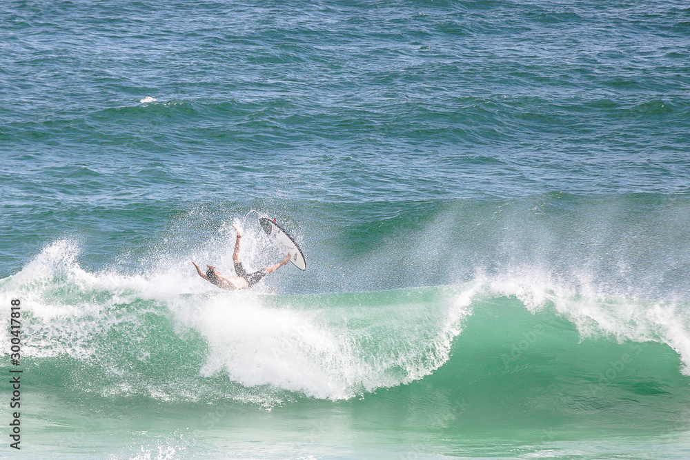 Obraz premium surfer wipeout