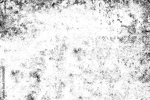 Grunge background black and white. Monochrome texture. Vector pattern of cracks, chips, scuffs. Abstract vintage surface