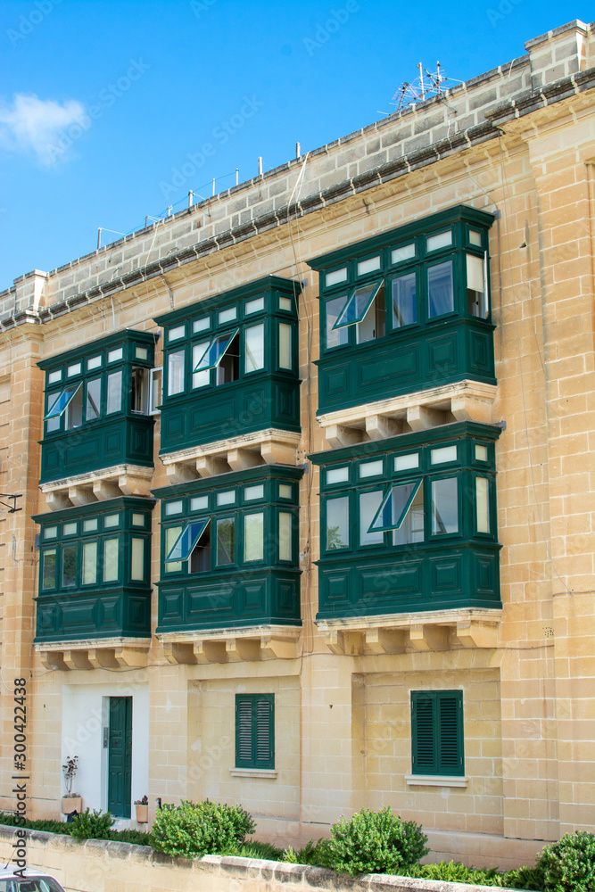 Fototapeta premium Traditional Malta colorful balconies 