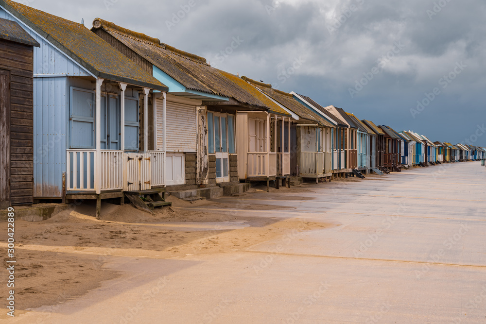 Grey clouds over the Beach Huts in Sandilands, Lincolnshire, England, UK Grey clouds over the Beach Huts in Sandilands, Lincolnshire, England, UK