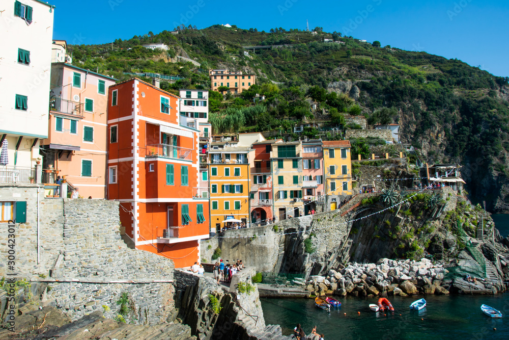 Colorful buildings in the port of Riomaggiore, Cinque Terre, La Spezia, Italy