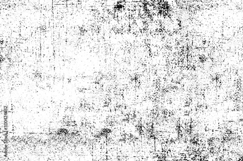 Grunge background black and white. Monochrome texture. Vector pattern of cracks, chips, scuffs. Abstract vintage surface