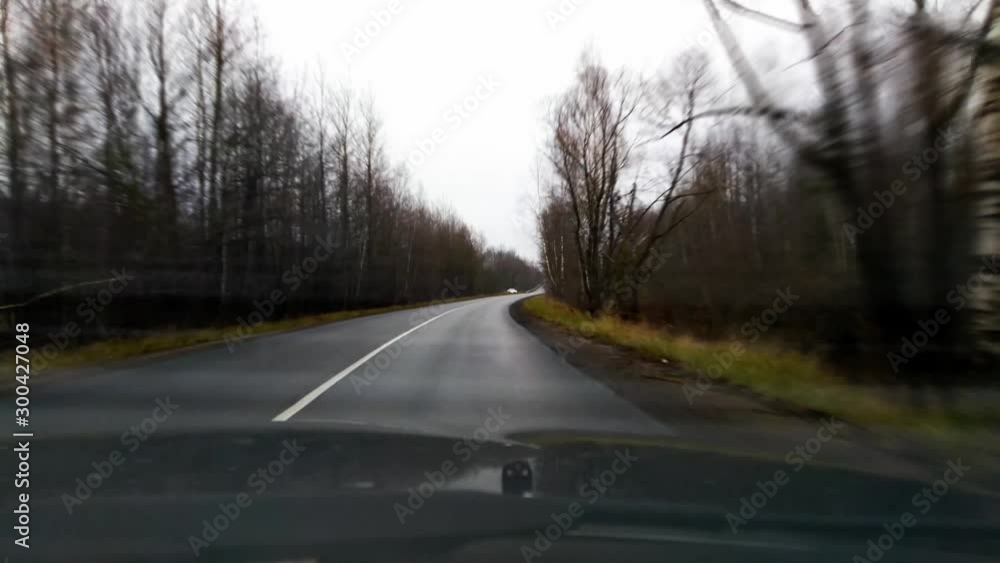 travel by car.car ride on a deserted road on an autumn day.first-person view.video footage made from the cab. travel by car.car ride on a deserted road on an autumn day.first-person view.video footage made from the cab.