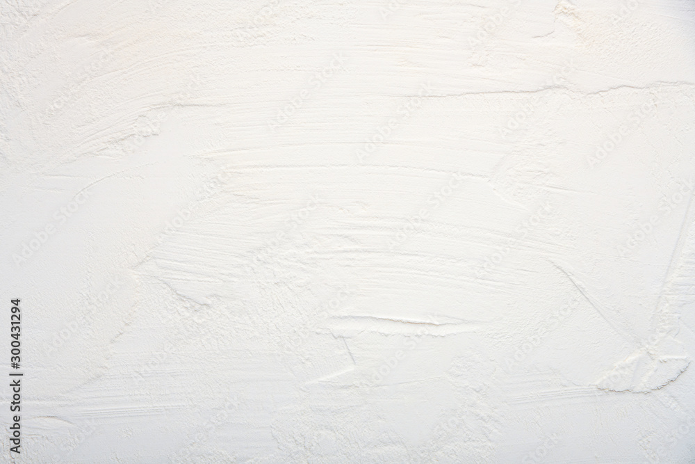 White textured background. Plaster. A place for a label. White textured background. Plaster. A place for a label.