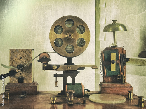 vintage effect image of an old morse code telegraph machine with bell and brass printer photo