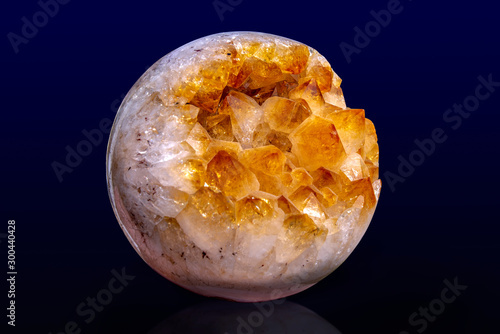 Crystals of citrine gemstone on dark background 