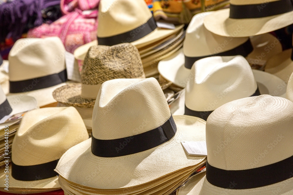 assortment of genuine hand-made panama hat on a shelf