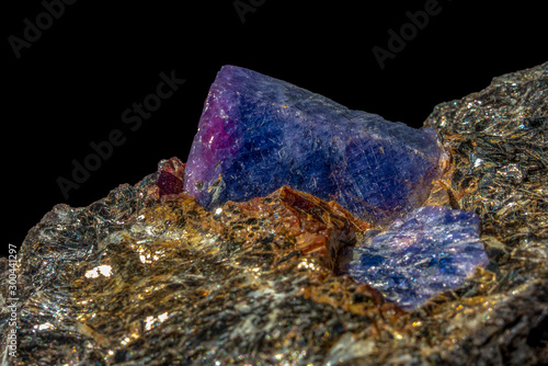 Macro mineral raw uncut blue sapphire crystal photo