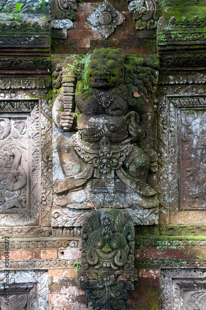 Stone carving Pura Dalem Penunggekan Temple Bali Indonesia