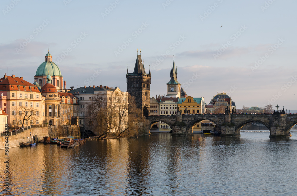 The Charles bridge and the Old Town Bridge Tower at sunset, Prague, Czech Republic