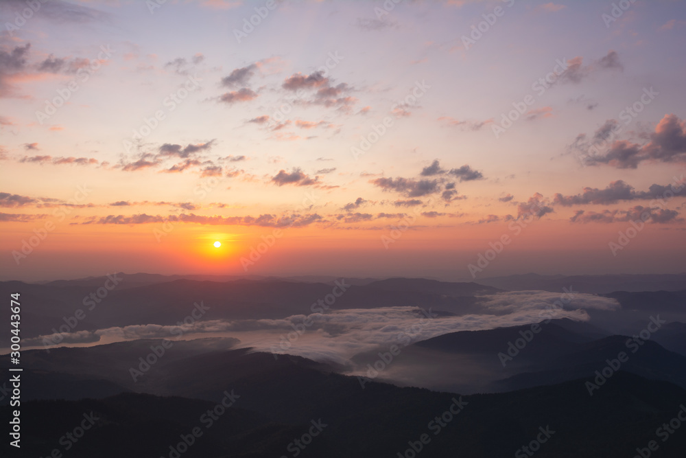 Fototapeta premium Beautiful sunrise in Carpathian mountains. Ceahlau National Park, Romania