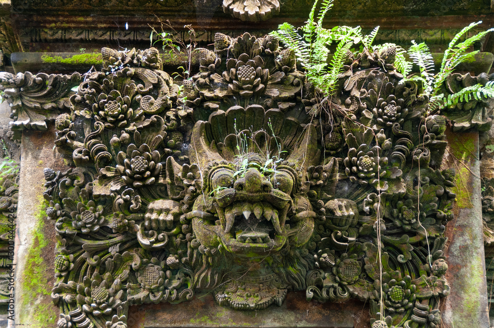 Stone carving over entranceway at Tirta Empul Holy Springs Bali Indonesia