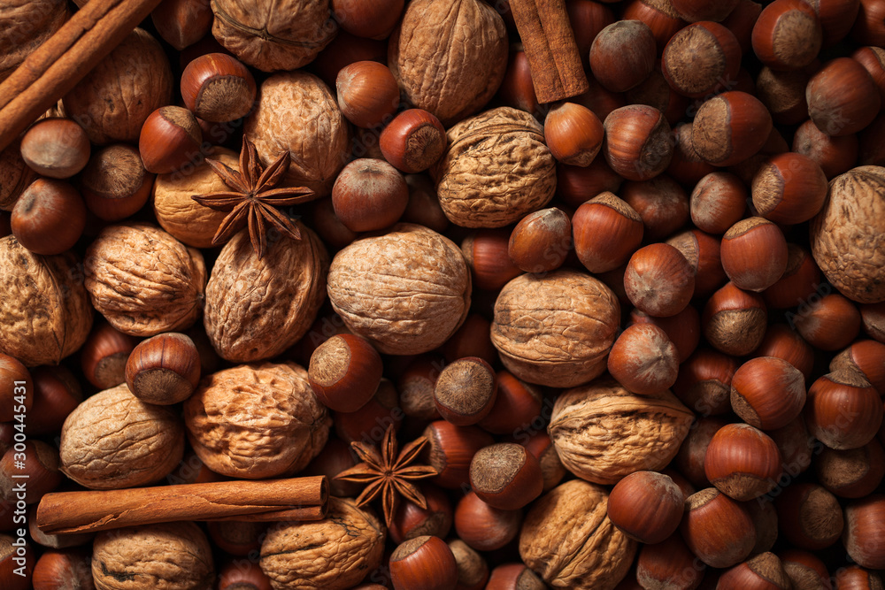 Nuts. Mix of nuts and spices. Food background Nuts. Mix of nuts and spices. Food background