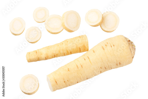 fresh parsley root with slices isolated on white background. top view