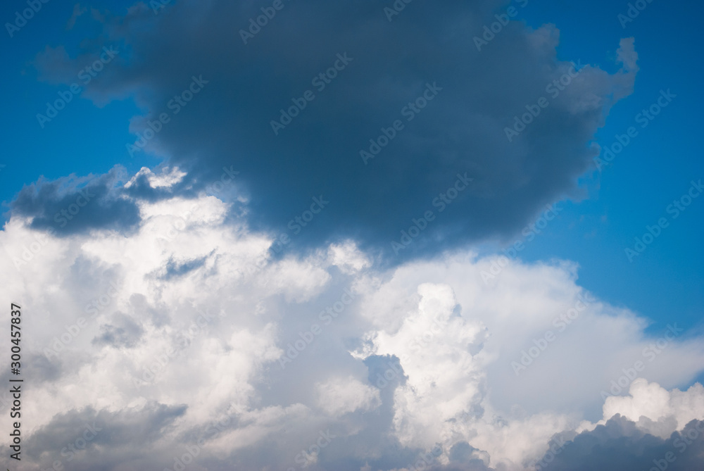 Fototapeta premium Blue sky background with white clouds