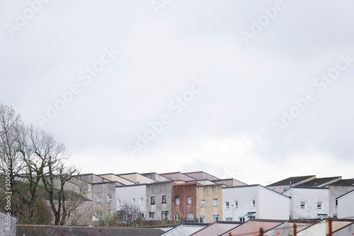 Derelict council house development in poor housing crisis ghetto estate slum in England uk
