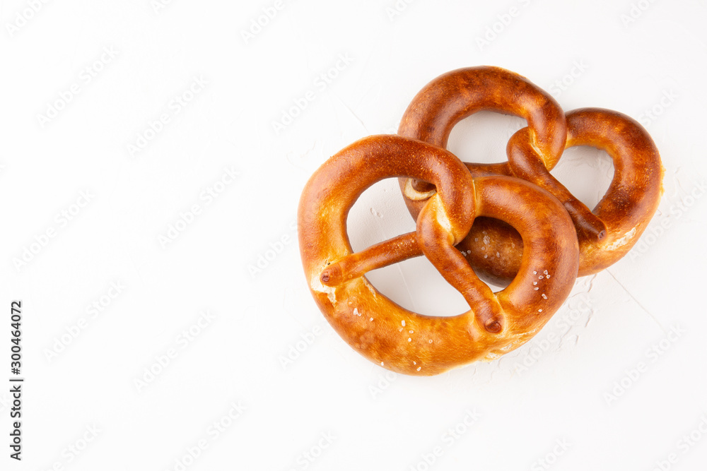 Pretzels with salt on white background top view. Copy space Pretzels with salt on white background top view. Copy space