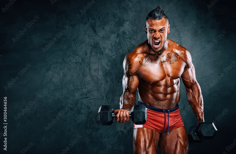 Strong Muscular Bodybuilder Lifting Weights Strong Muscular Bodybuilder Lifting Weights