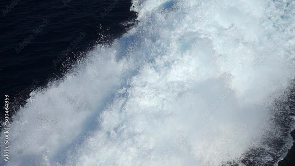 Slow motion video of ocean water splashing from power motor boat engine Slow motion video of ocean water splashing from power motor boat engine