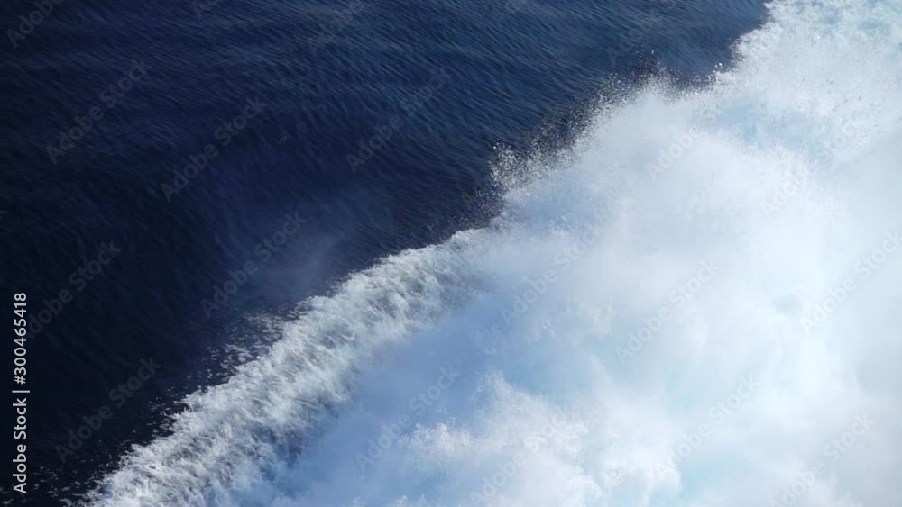 Slow motion video of ocean water splashing from power motor boat engine Slow motion video of ocean water splashing from power motor boat engine