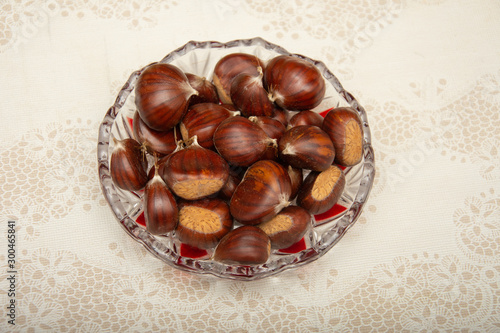A small pile of chestnuts, conkers isolated 